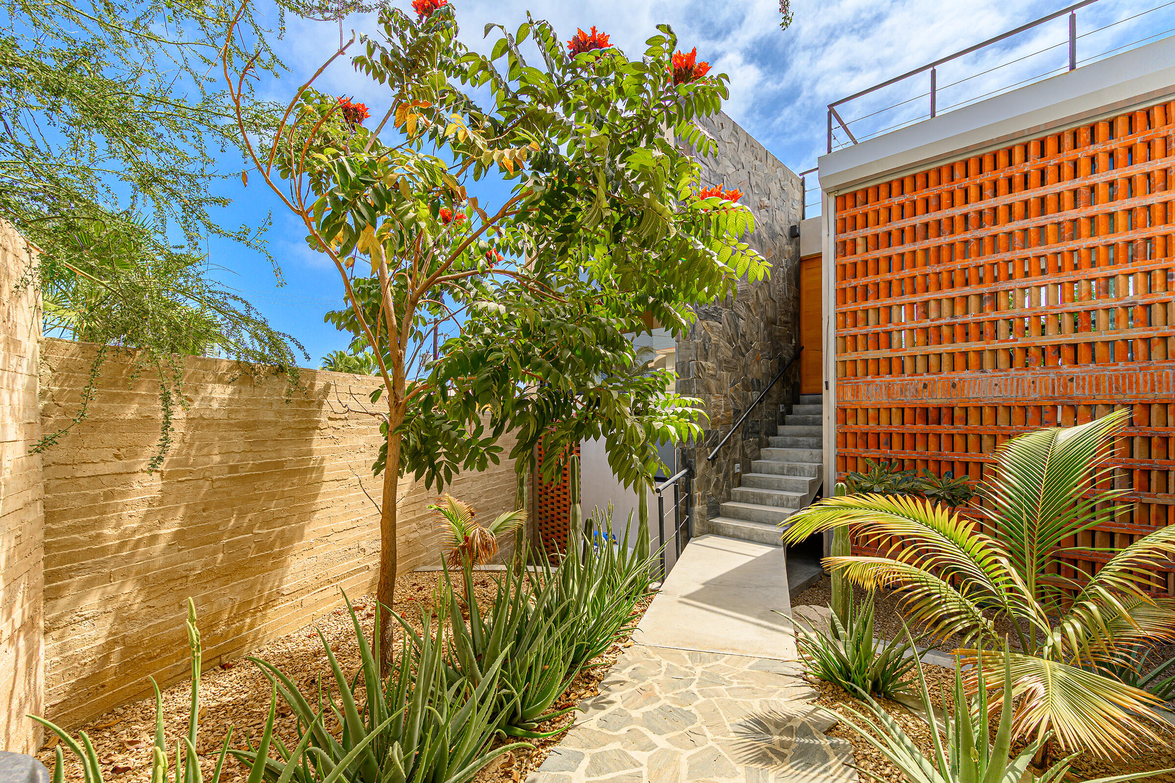 Los Cabos Cabo Bello Casa Blue Fin is a rare DUPLEX investment opportunity in the desirable oceanside community of Cabo Bello. This versatile 4-bedroom, 4-bathroom home offers incredible potential for rental income, full-time or multi-generational living, or both. Each level features 2-bedrooms and 2-bathrooms with private entrances in front and back, making it ideal for generating revenue while maintaining personal privacy or hosting extended family and guests.Enjoy beautiful for sale