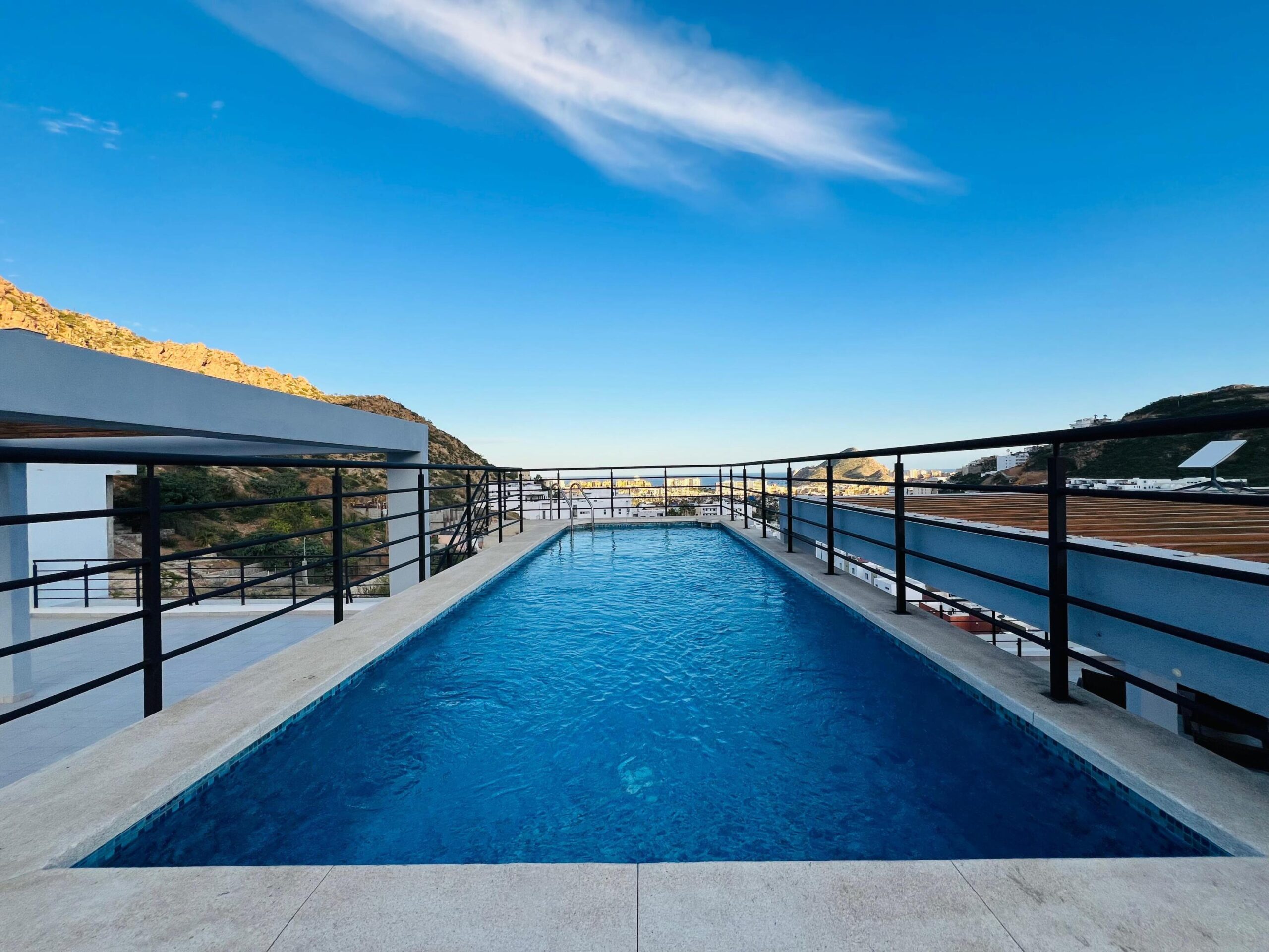 Los Cabos Breeze Of Cabo Discover the charm of Ground Floor Unit #103 at Breeze of Cabo, located in the sought-after Sunset area of Cabo San Lucas.This modern 2-bedroom, 2-bathroom condo features a spacious private patio — perfect for enjoying the warm weather and outdoor living. , the unit includes underground parking and access to a shared rooftop with a swimming pool and panoramic ocean for sale
