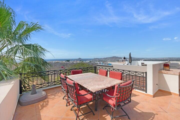Los Cabos Cumbre Del Tezal Move-in ready and fully furnished. 2,045 sq ft of construction on a 2,551 sq ft lot with 3-car parking. Luxury finishes include marble flooring, wood kitchen with granite countertops, built-in wooden closets in all bedrooms, and vanities with tempered glass shower doors in all 3.5 baths. Fully equipped with 5 Gree inverter mini-split A/C units (3 × 1-ton, 2 × 2-ton), LG 22' French Door refrigerator, Whirlpool gas stove, and 1.7 cu ft microwave hood. Additional features: rooftop with bar, grill & sink, private terrace, storage, WiFi smart lock, private 5,000-liter cistern, and termite prevention system. ommunity: pool, gym, sports courts, kids' area, 3 clubhouses & 24/7 gated security for sale
