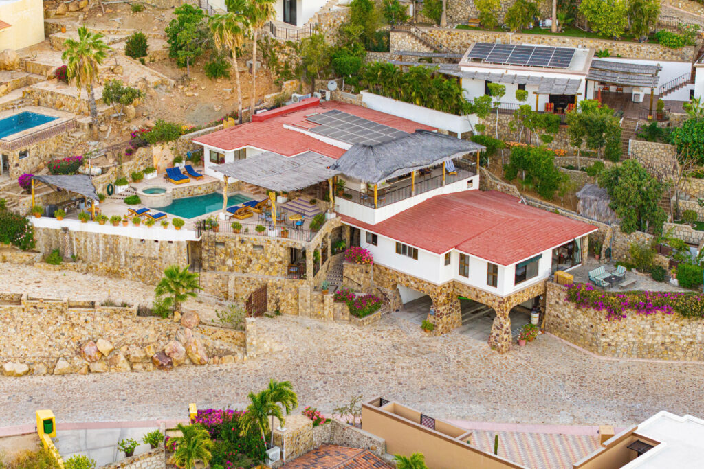 Los Cabos Pedregal Csl Villa Felicidad is a 5-bedroom, 5.5-bath residence in Pedregal that combines scale, location, and proven income potential. Set just minutes from the main gate and within walking distance to the marina, it offers effortless access to Cabo's best dining and nightlife while maintaining privacy. The home features a private pool, expansive terraces, and panoramic marina – Camino del Patron, Cabo San Lucas, BS