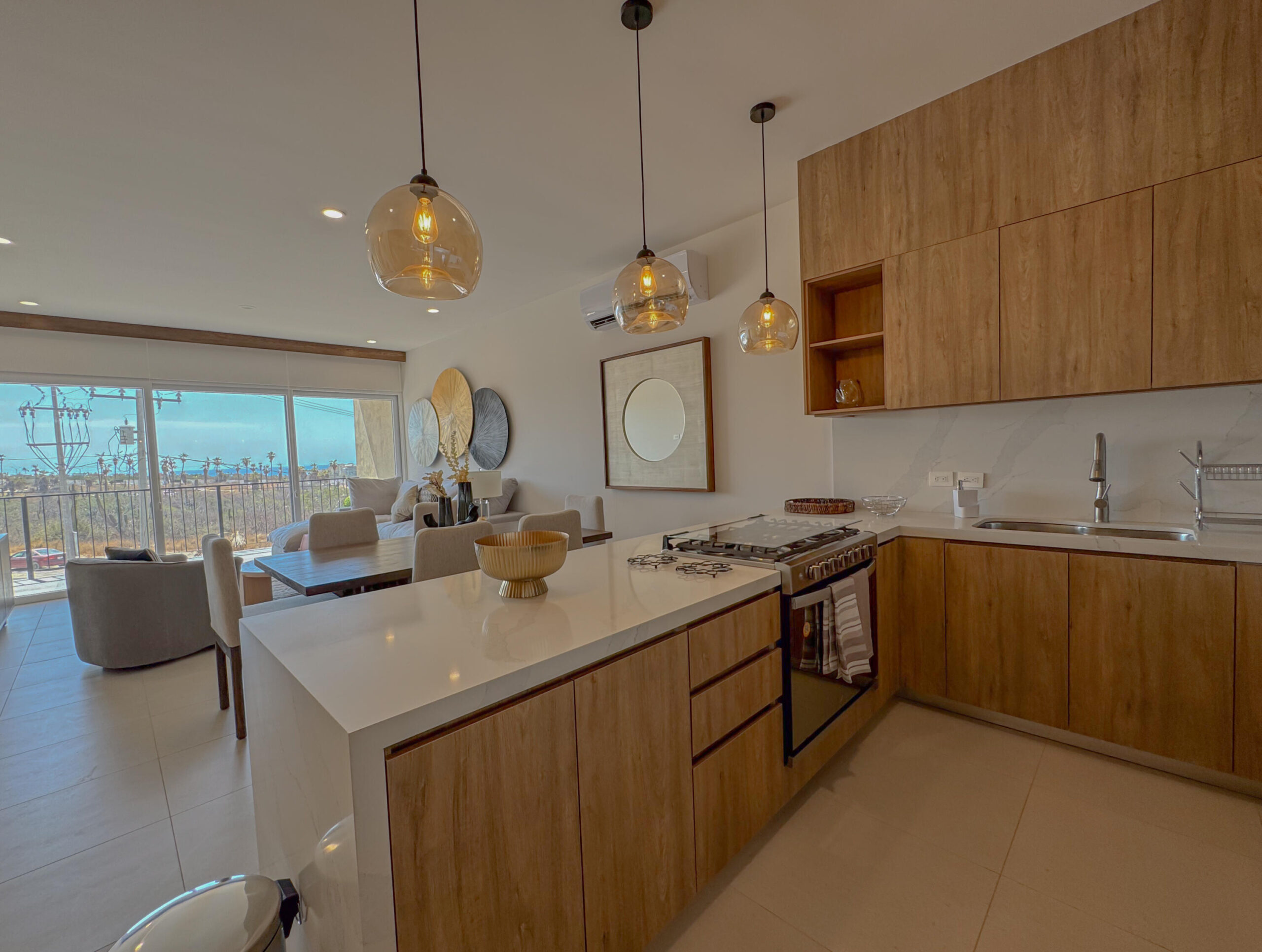 Los Cabos Villas Del Sol Great location, close to all amenities in Cabo San Lucas, walking distance to Medano Beach and to the CSL Marina, restaurants, bars, shops, supermarkets and all vibrant life in Cabo! This 115 m2 (1240 sqft) under AC condo has ceramic floor tiles, high vaulted ceilings, lots of natural light, back terrace with sink, electric water heater, AC mini splits and ceiling fans on each room, hardwood kitchen with propane stove, laundry closet, large living area, one parking space. Villa del Sol is a boutique gated community of only 22 private residencies with common palapa and pool area. Low HOAs. Walk everywhere, enjoy Cabo! for sale