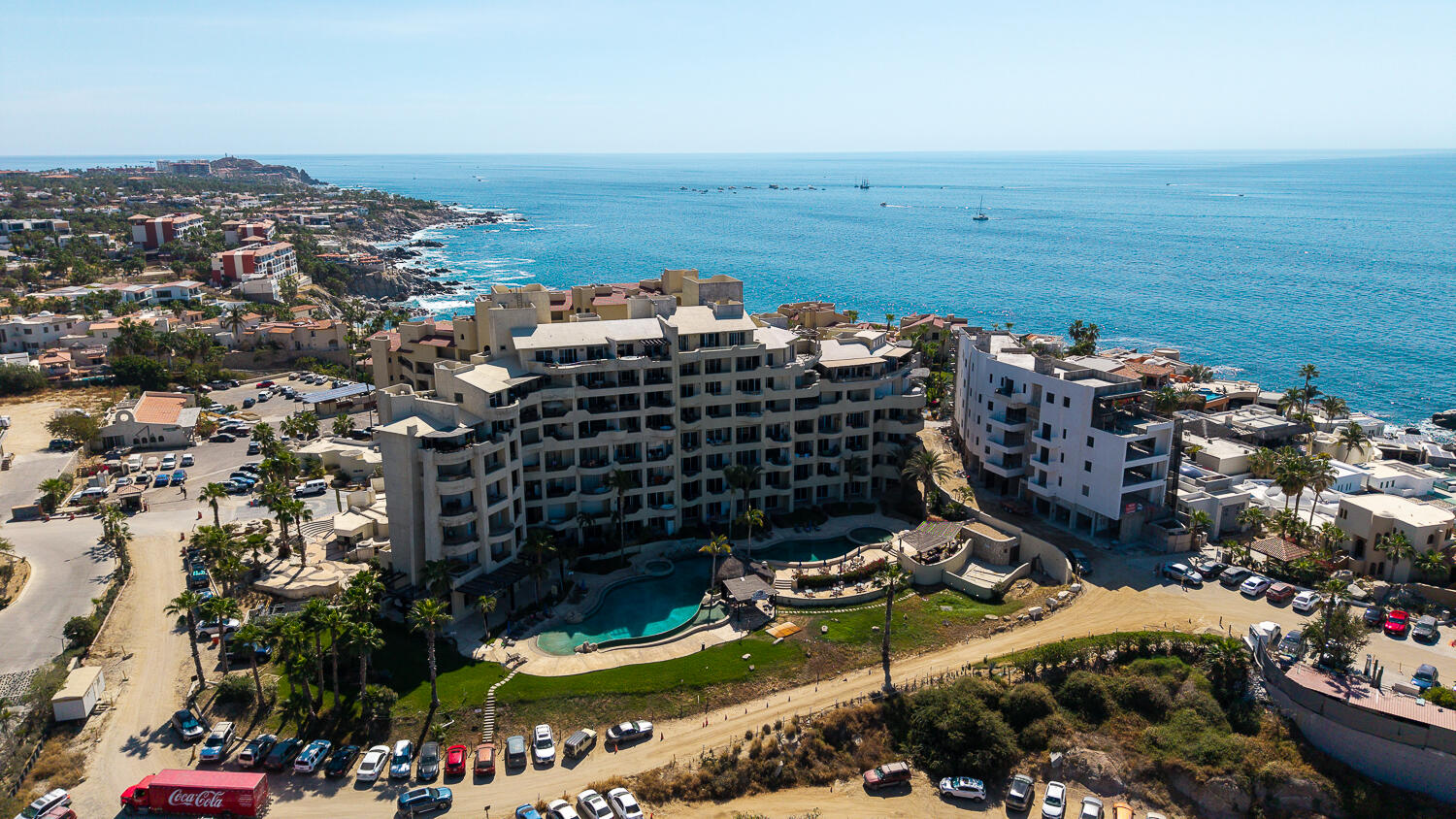 Los Cabos Marea Los Cabos Located in the exclusive Marea development, this 1,480 sq. ft. condo offers the premier downtown Cabo San Lucas lifestyle just 500 meters from Medano Beach. The contemporary, open-concept design features three spacious bedrooms--each with its own private balcony--and floor-to-ceiling windows that flood the sleek, white-cabinetry kitchen and living areas with natural light. This turnkey property is a lucrative opportunity for investors, coming fully furnished, equipped, and ready for immediate rental income with no renovations required. Residents enjoy premium community amenities, including 24/7 security, a lobby, a gym, and a sparkling pool. The standout rooftop terrace, with a jacuzzi , provides the perfect vantage point to take in the city for sale