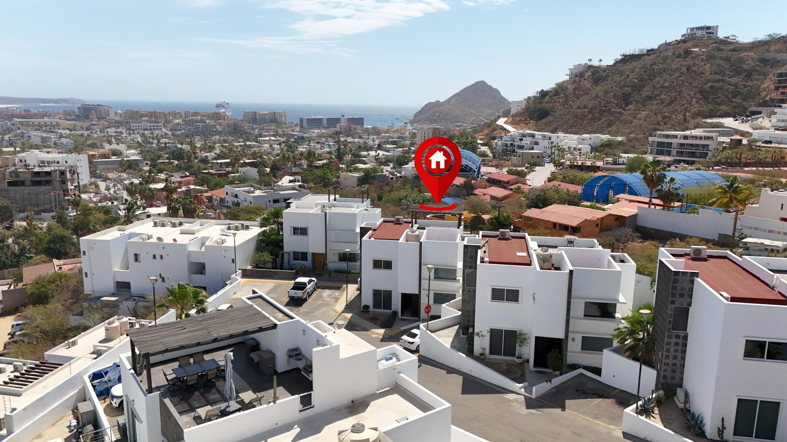 Los Cabos Toscana Residences Located at the Hidden Gem of El Tezal, House #9. This charming home offers a blend of comfort and convenience in a picturesque setting. Ground Floor: Features three spacious bedrooms, two full bathrooms, a TV area, and a backyard with direct access to the terrace and roof. Middle Level: Includes a well-designed kitchen, laundry room, dining area, living area, and additional social space. Enjoy two terraces and stunning ocean for sale