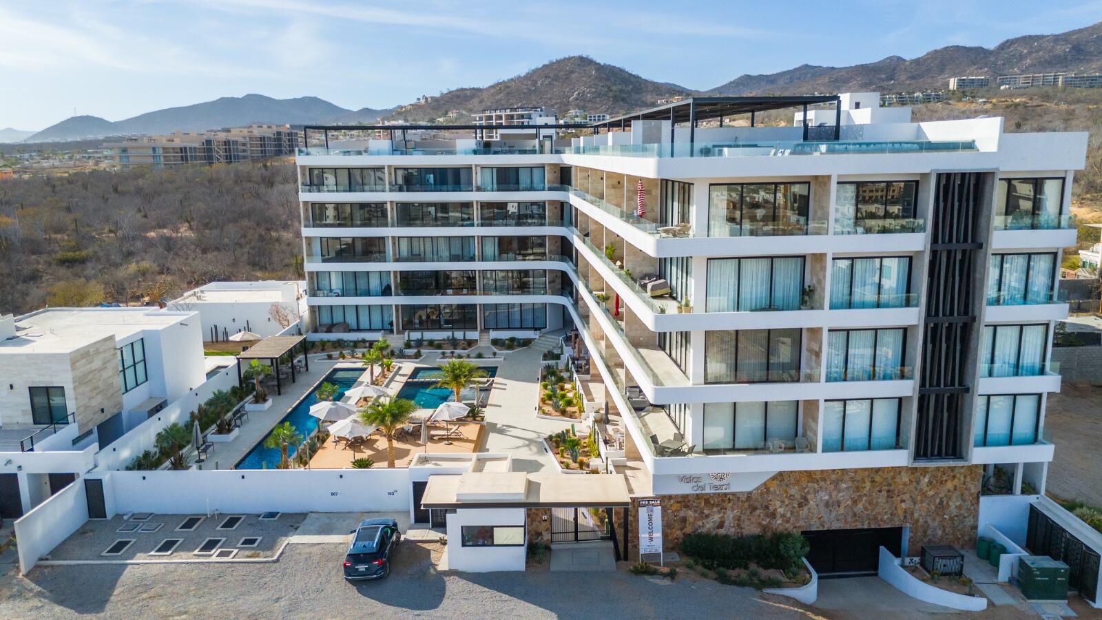 Los Cabos Dunna Welcome to Dunna - A New Standard of Luxury in Cabo. More than a residence, Dunna is a vibrant, fully integrated community where luxury, culture, and recreation converge. Designed by renowned architect Sordo Madaleno, this visionary development seamlessly blends timeless elegance with natural tranquility, offering meticulously crafted residences and garden villas complemented by world-class amenities. Elevated Living, Unmatched Experiences Choose from 13 thoughtfully designed floor plans from 2 - 5 bedrooms ranging from 1,475 - 6,458 sq. ft., featuring seamless indoor-outdoor living, elegant finishes, private rooftops, Jacuzzis, and lush garden terraces. Resort-Style AmenitiesEnjoy unparalleled amenities, including:" Infinity pools (Adults-only, Family, Kids & Oasis)" State-of-the-art wellness & fitness center" Luxury spa (sauna, steam, ice baths, massage suites)" Exclusive rooftop lounges & panoramic for sale